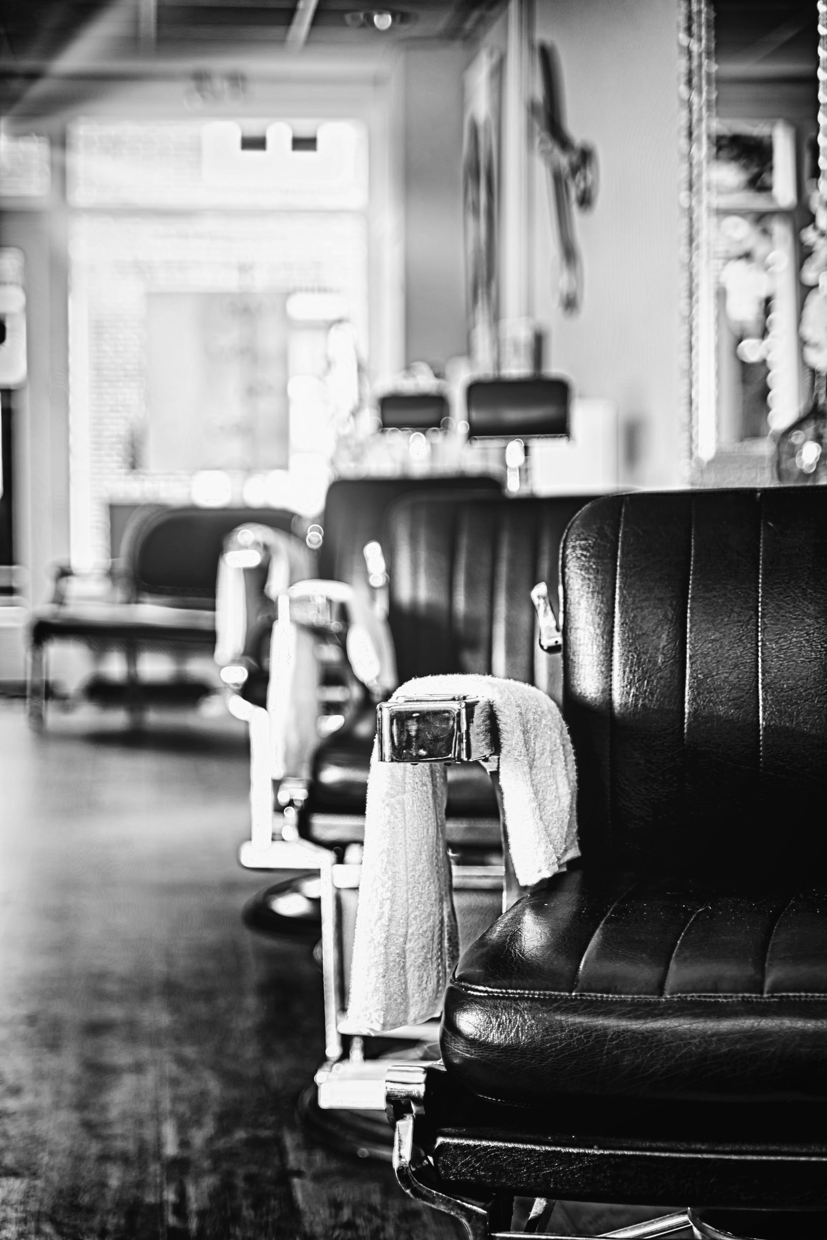 Barber chair and towel detail in black and white