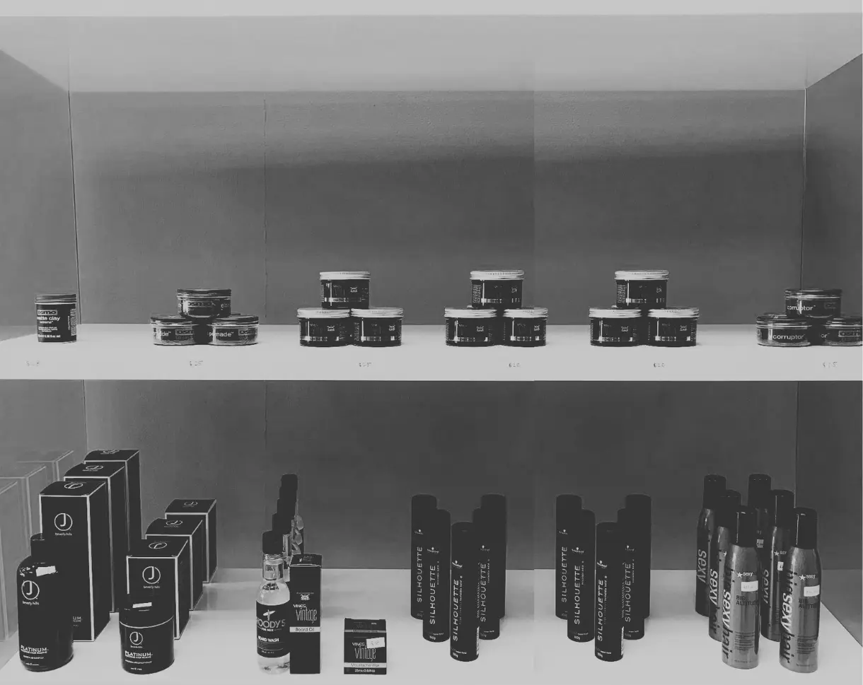 Hair and grooming products displayed on shelves at The Boss