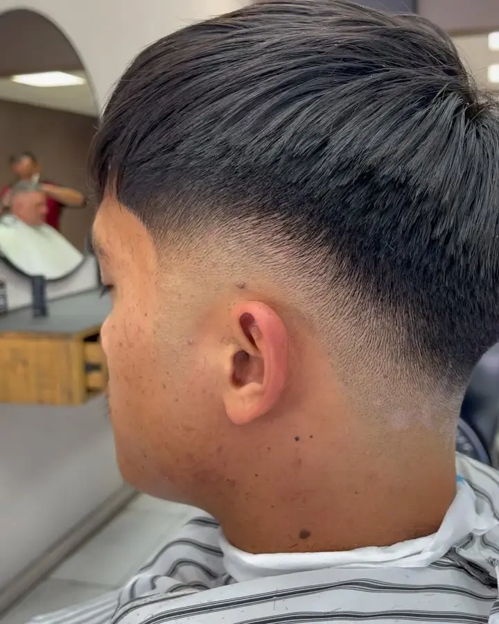 Close detail of a finished low fade haircut